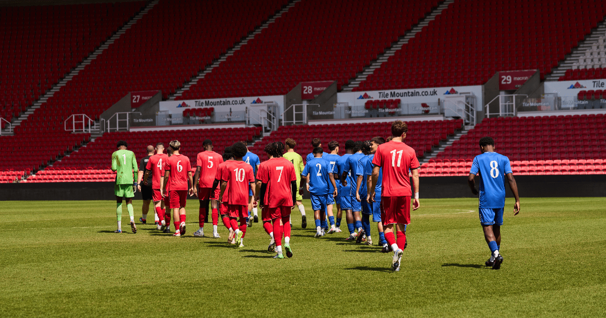 FCV International Football Academy players walking out on the pitch at the BET365 Stadium, Stoke