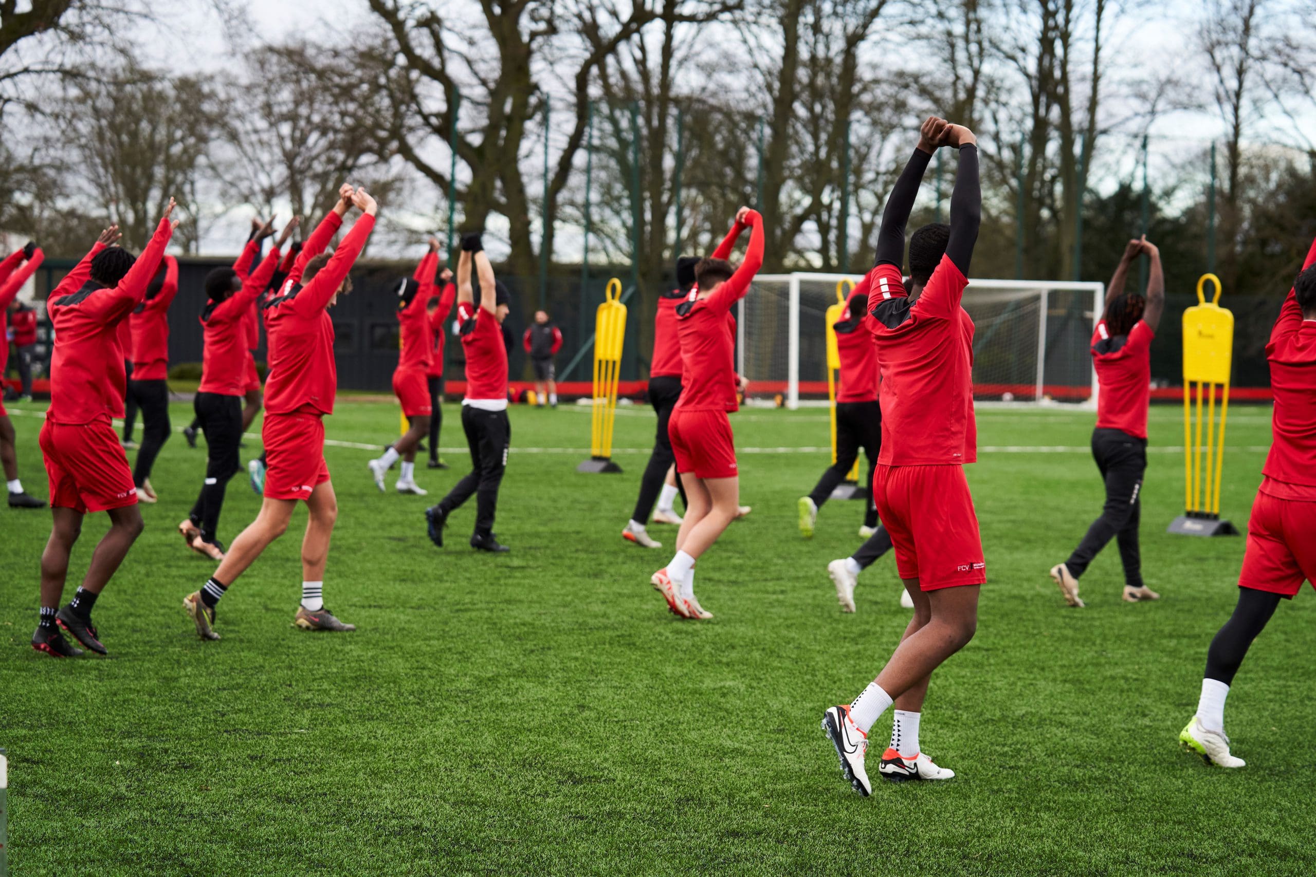 FCV football academy players warming up before training