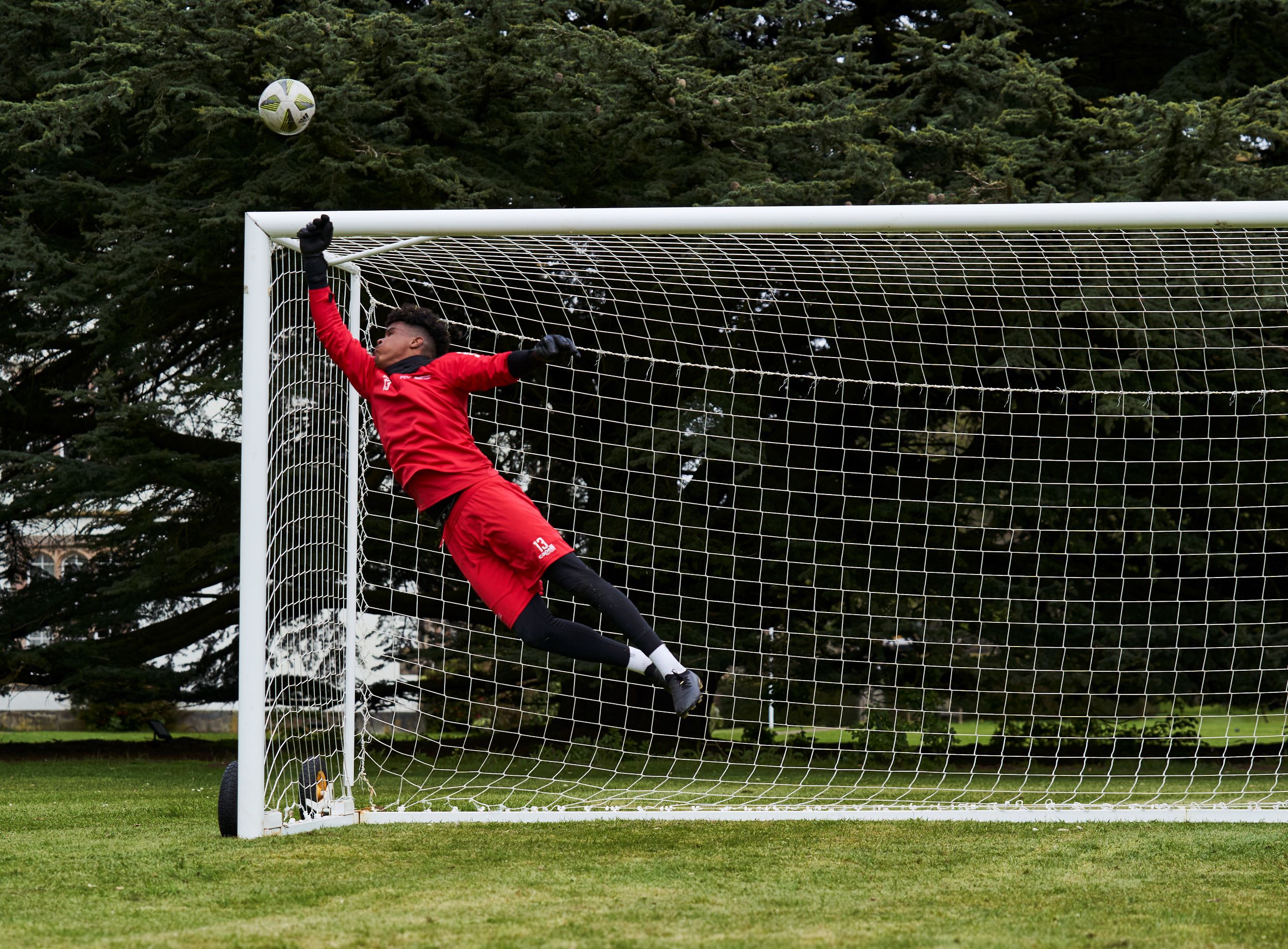 Goalkeeper at FCV making save into the top corner