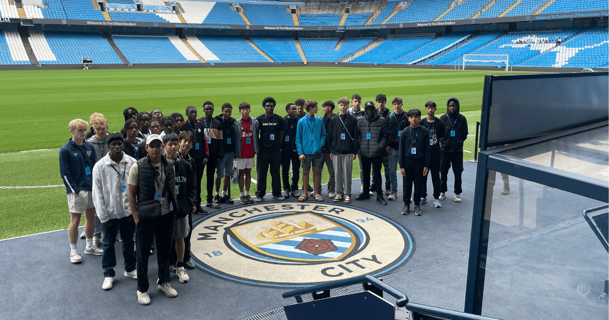 Group photo of our summer camp players at the Etihad Stadium