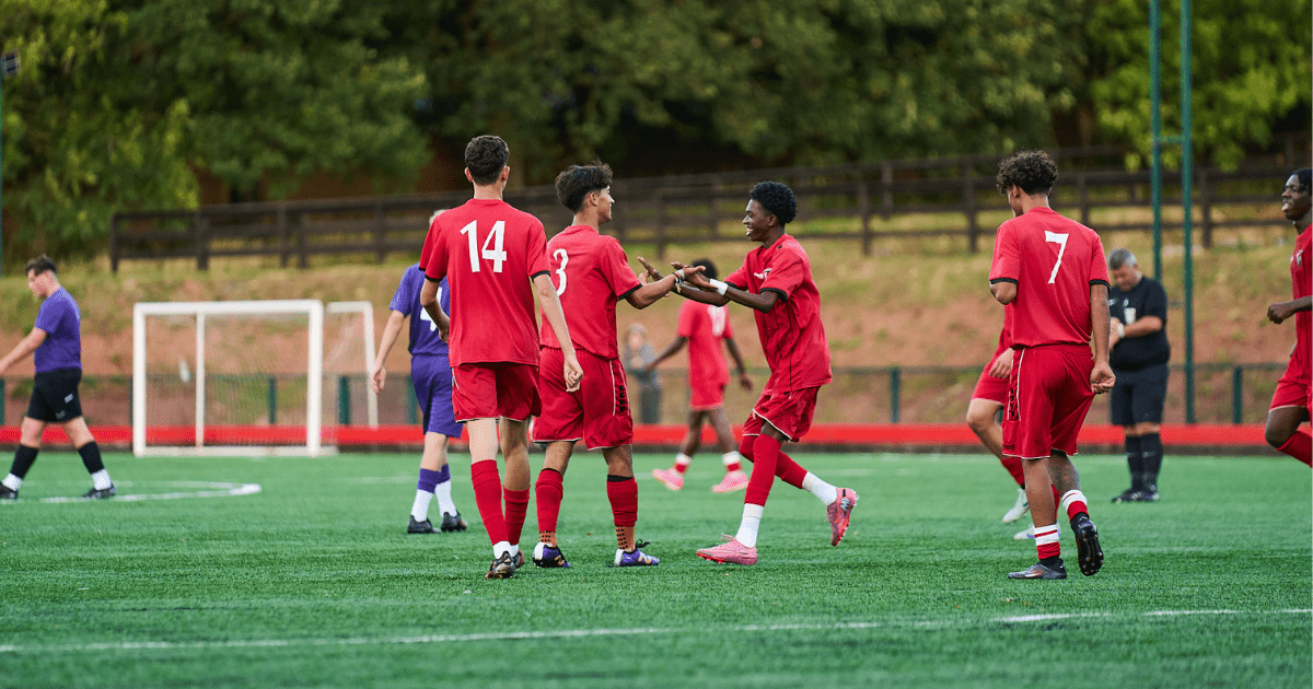 Football Summer Camp players celebrating a goal